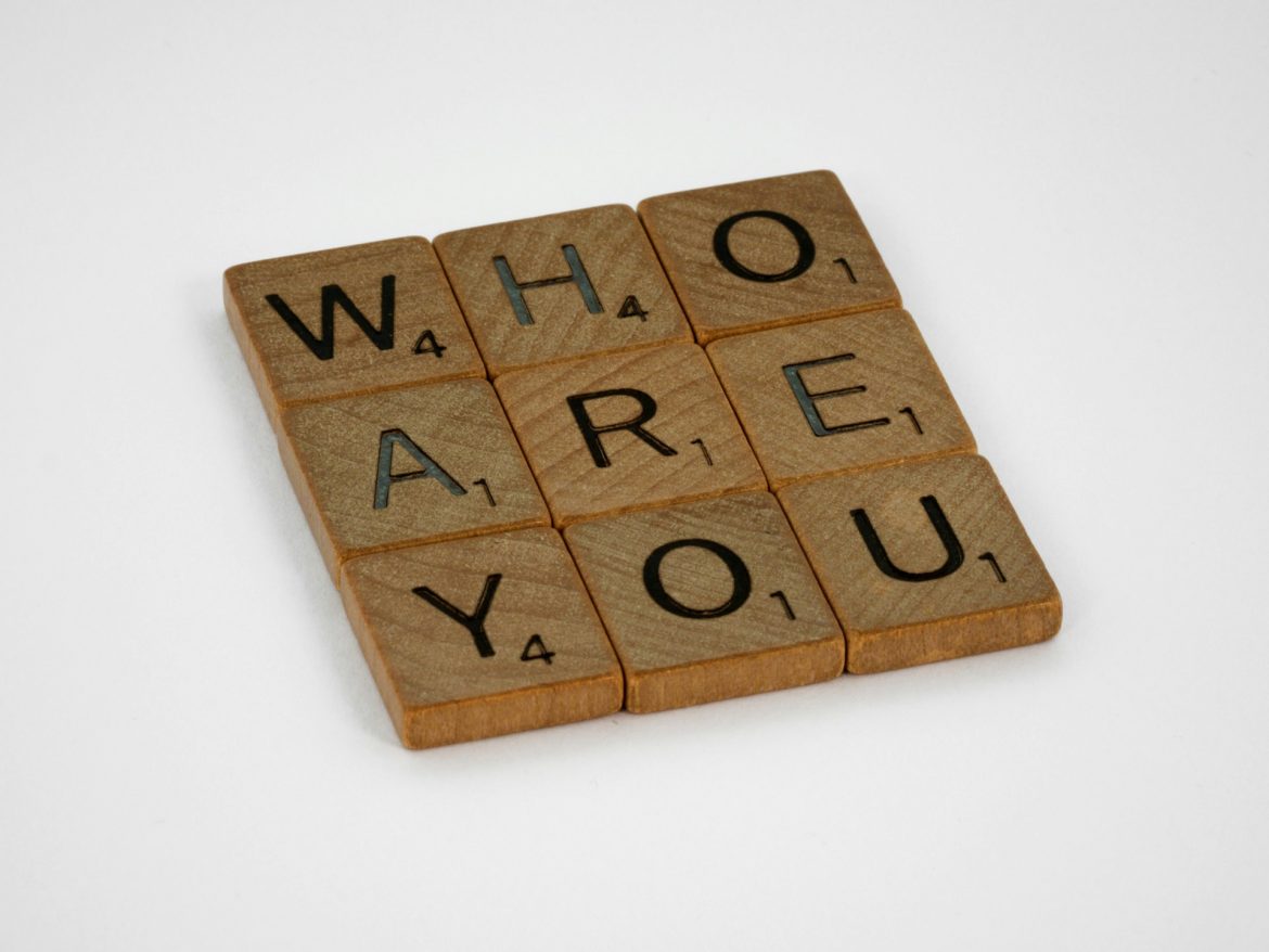 scrabble tiles spelling who are you